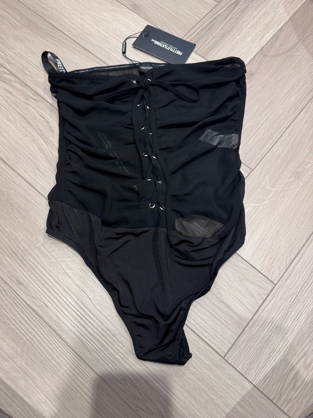 PrettyLittleThing Black Lace-Up Sheer Mesh Bandeau Bodysuit